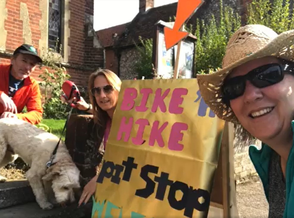 People welcoming Bikers and Hikers